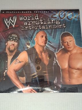 New Sealed WWE 2004 16 Month Calendar BROCK LESNAR, UNDERTAKER, THE ROCK